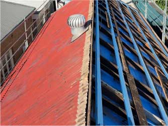 Metal roof repair at Newtown