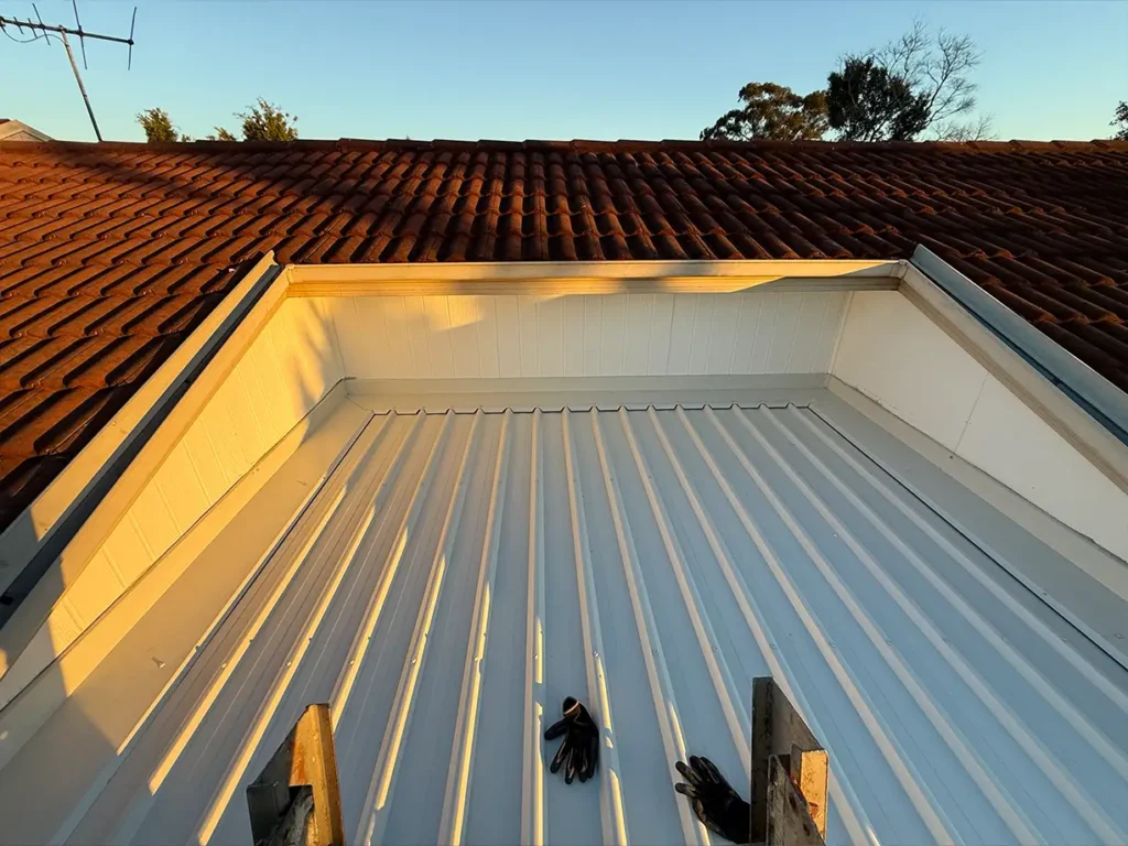 Completed Surfmist TRIMDEK patio roof with new gutter in Wattle Grove NSW