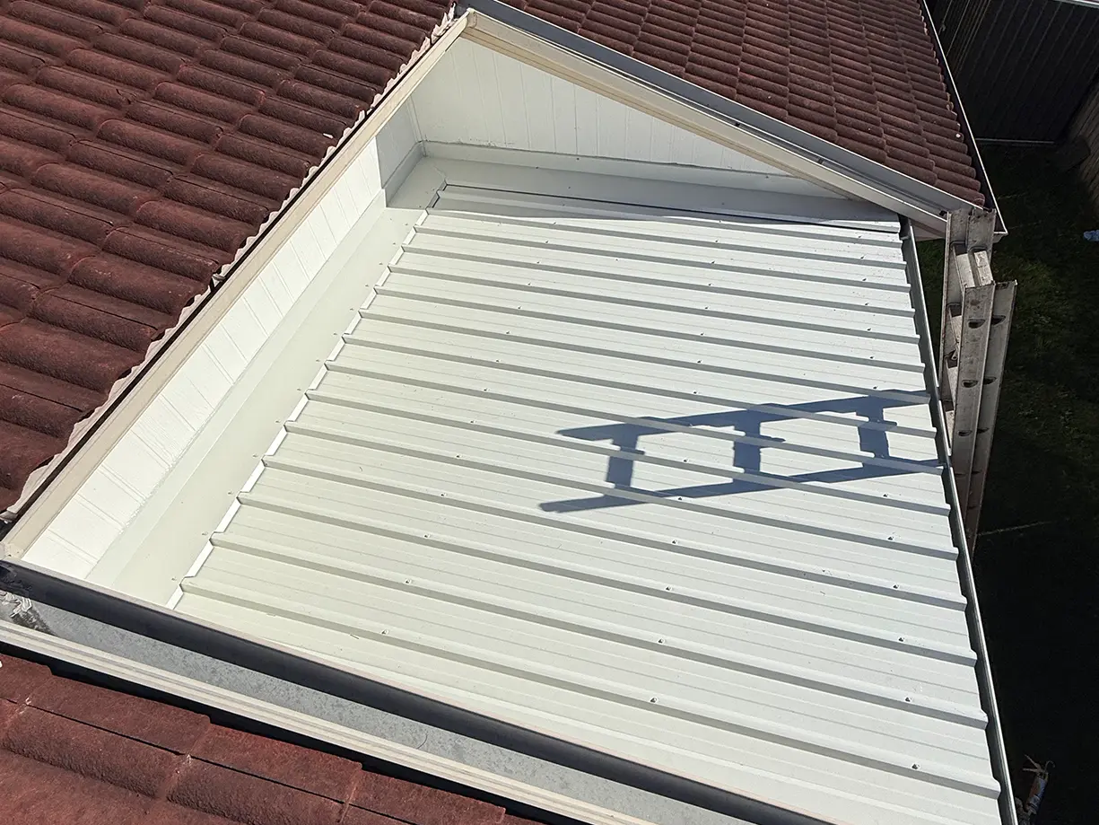 Completed Surfmist TRIMDEK patio roof with new gutter in Wattle Grove NSW